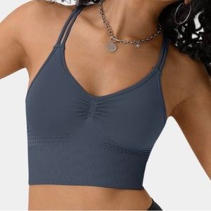 Brand new!! Great quality and super cute dark blue halara top.